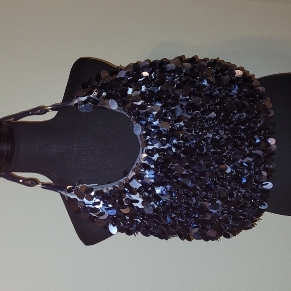 @ladyc2016 Handbags - ❤HP❤️NWOT Pewter Disc Bling Handbag❤